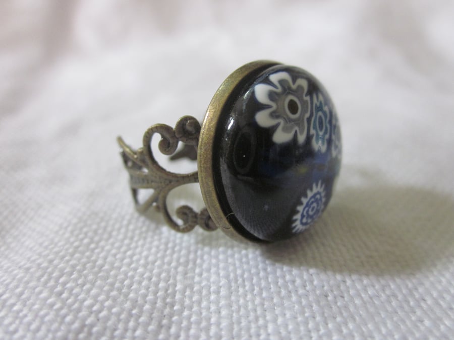Handmade glass cabochon filigree ring - blue and white flowers on black