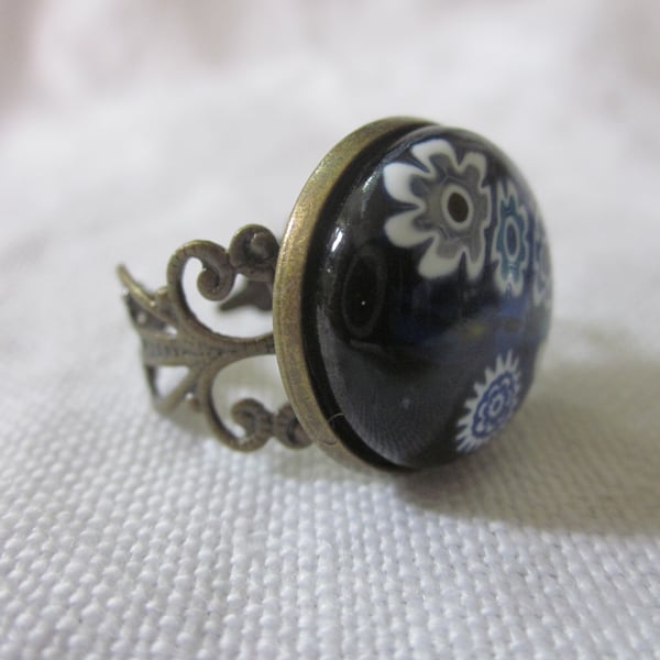 Handmade glass cabochon filigree ring - blue and white flowers on black