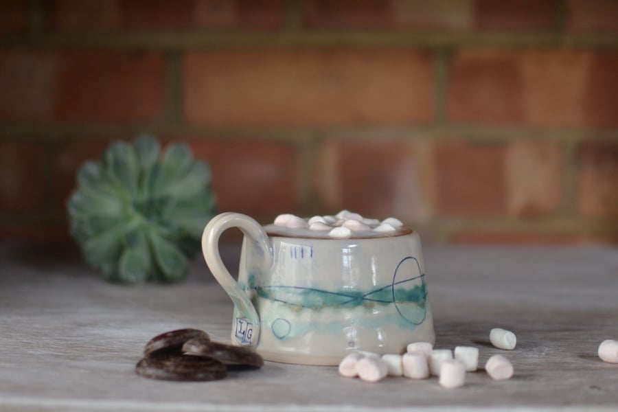 Ceramic cup - Seascape. glazed in white, turquoise and greens