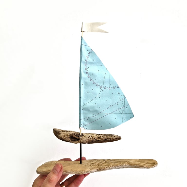 Blue and white driftwood sailboat ornament, nautical map sail