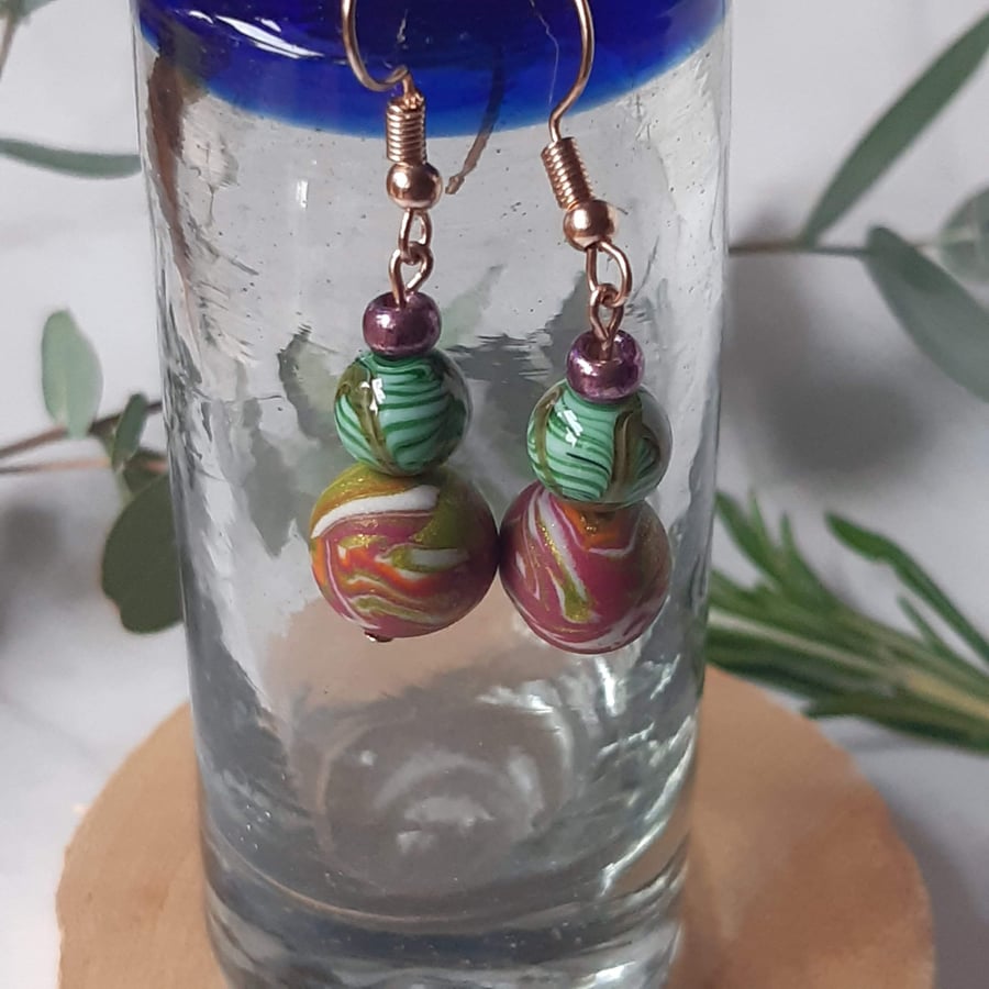 Dangly polymer clay earrings in raspberry pink and lime