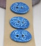 3 Medium Oval Cornflower Blue Brocade Pattern Ceramic Buttons - Image 1