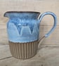 Larger pale blue carved jug (straight shoulder) - Image 1