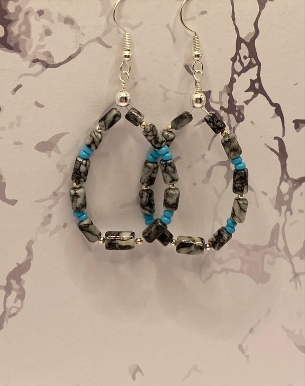 Wire teardrop earrings with pinolith stone tubes 