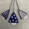 Set of three ceramic Christmas tree decorations 