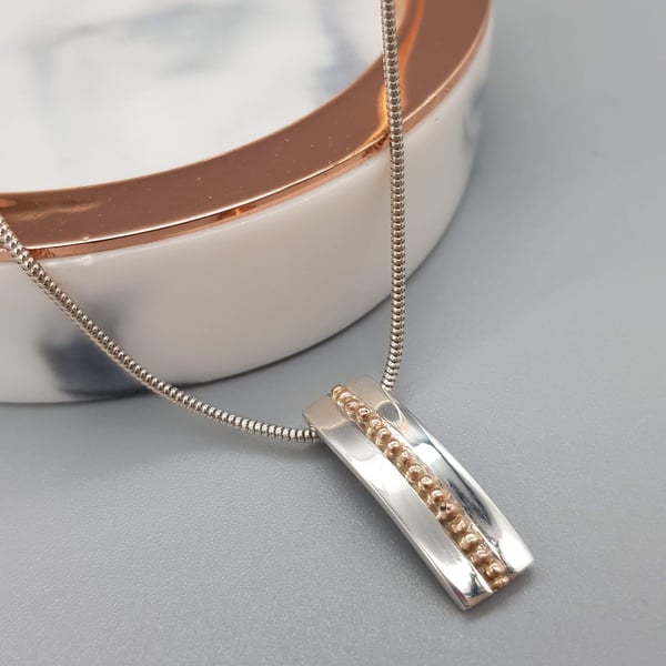 Sterling Silver And 9ct Rose Gold Dot Pendant With Chain