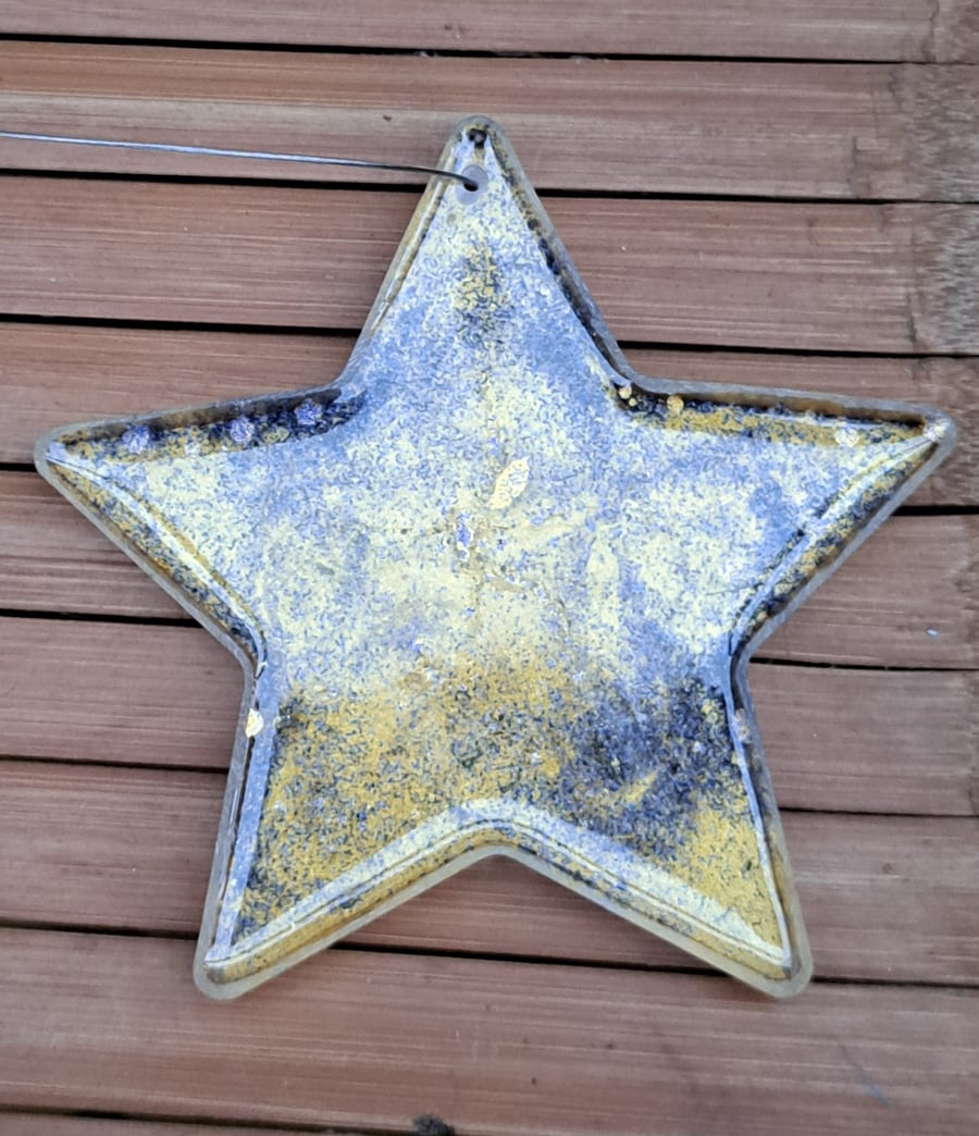 Hanging gold and blue glitter galaxy star