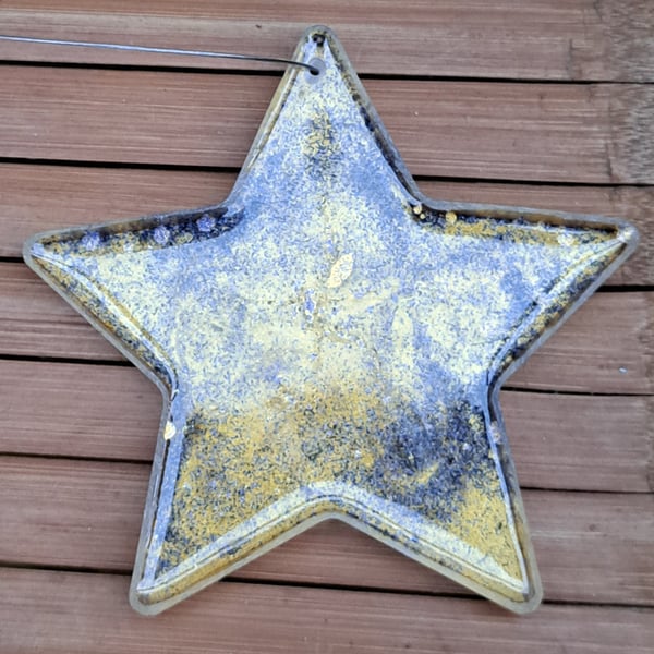 Hanging gold and blue glitter galaxy star