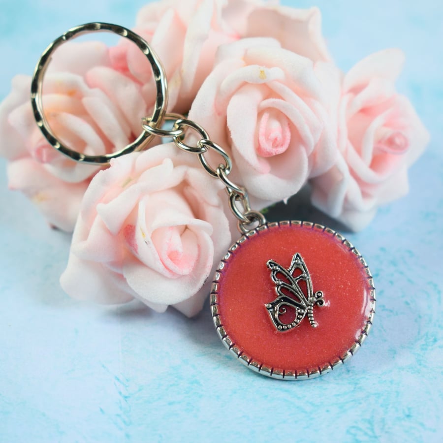 Coral Keyring with Filigree Butterfly