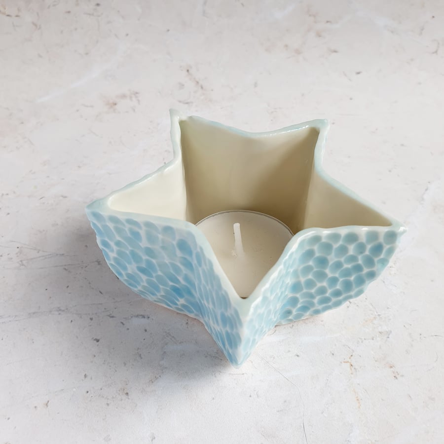 Pebble star tealight holder