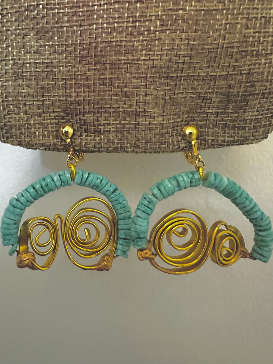 Gold earrings with blue shell beads