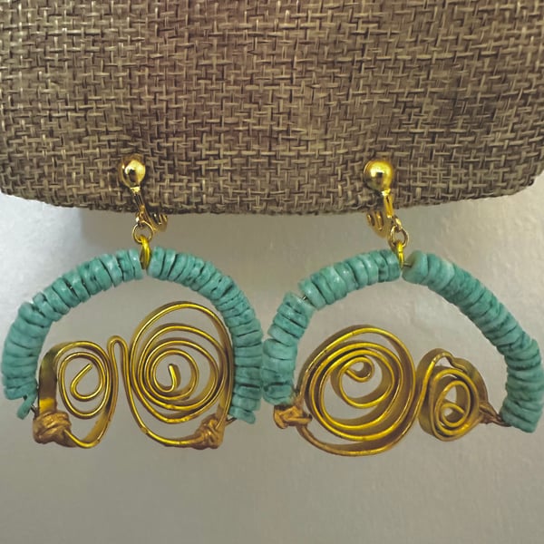 Gold earrings with blue shell beads