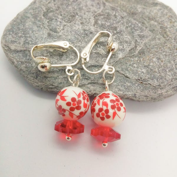 Red and White Bead Clip On Earrings With a Flat Red Flower Bead