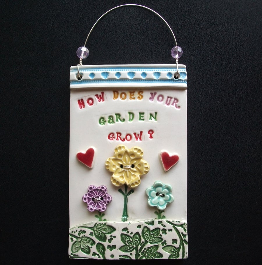 Ceramic How does your garden grow? wall plaque folksygardeners