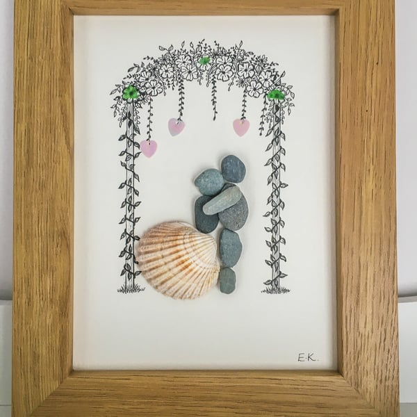 Framed pebble art.” pebble couple” handmade in Cornwall 