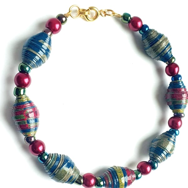 Vibrant paper beaded bracelet made of red, blue and green wallpaper