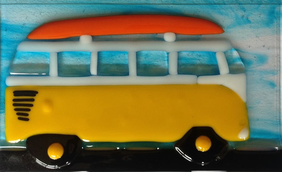 VW Camper with surfboard