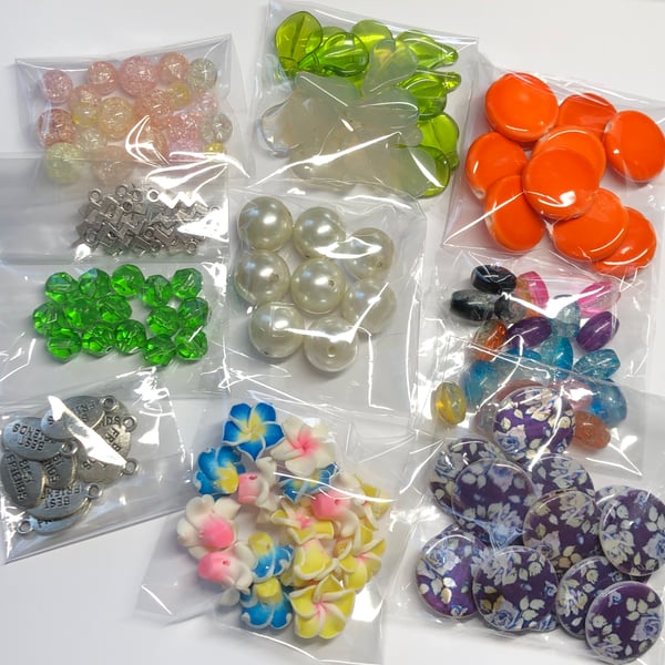 Ten mixed packs jewellery making beads and charms 