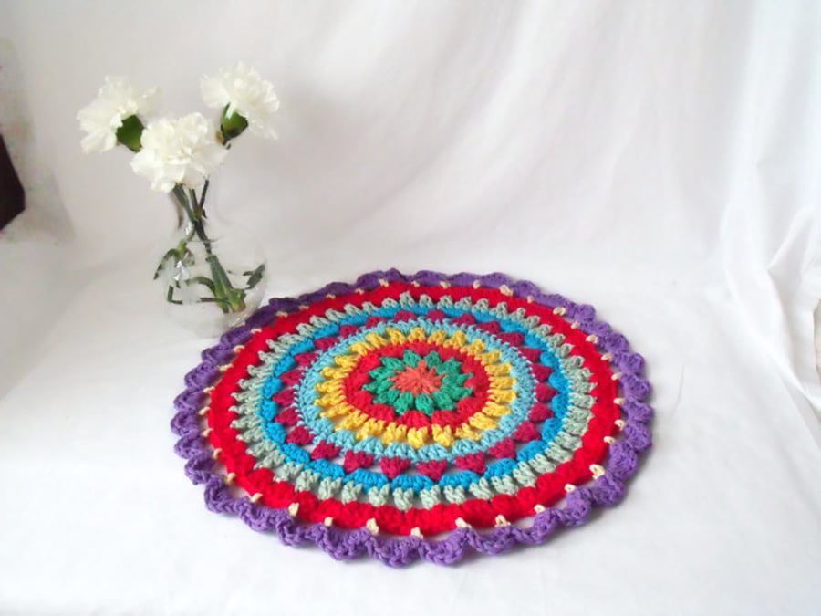 large multi coloured crocheted mandala doily for your home