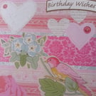 Pink flowers and bird birthday wishes greeting card