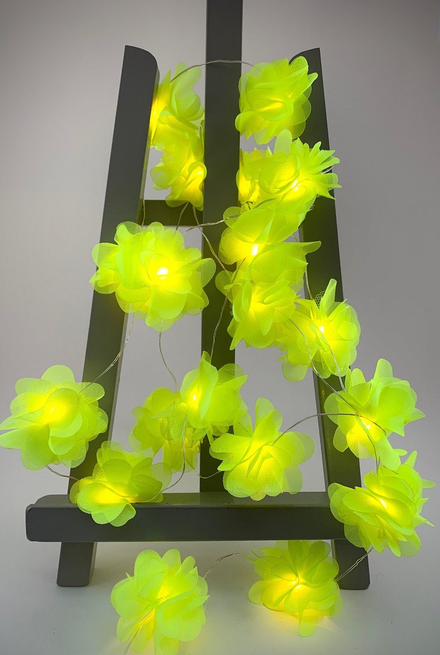 20 chiffon flower Fairy Lights in fluorescent yellow.
