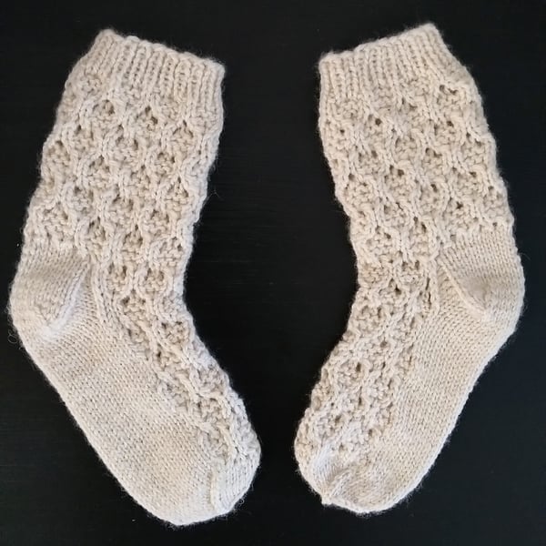 Hand-knitted pure wool socks in natural white 