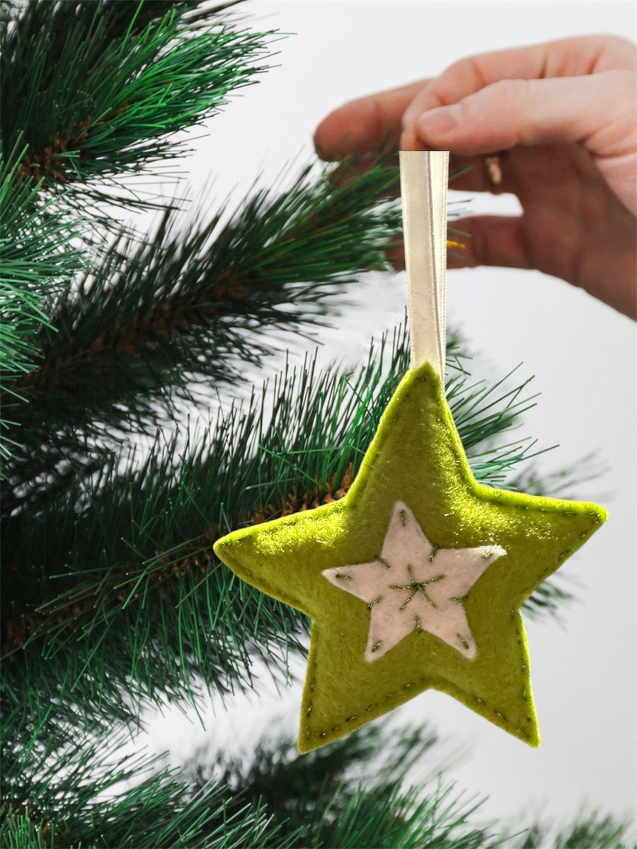 A star tree decoration, lime green and white with shiny metallic thread