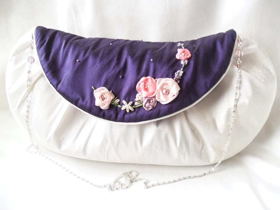 Ivory silk evening or wedding bag with embroidered purple flap.