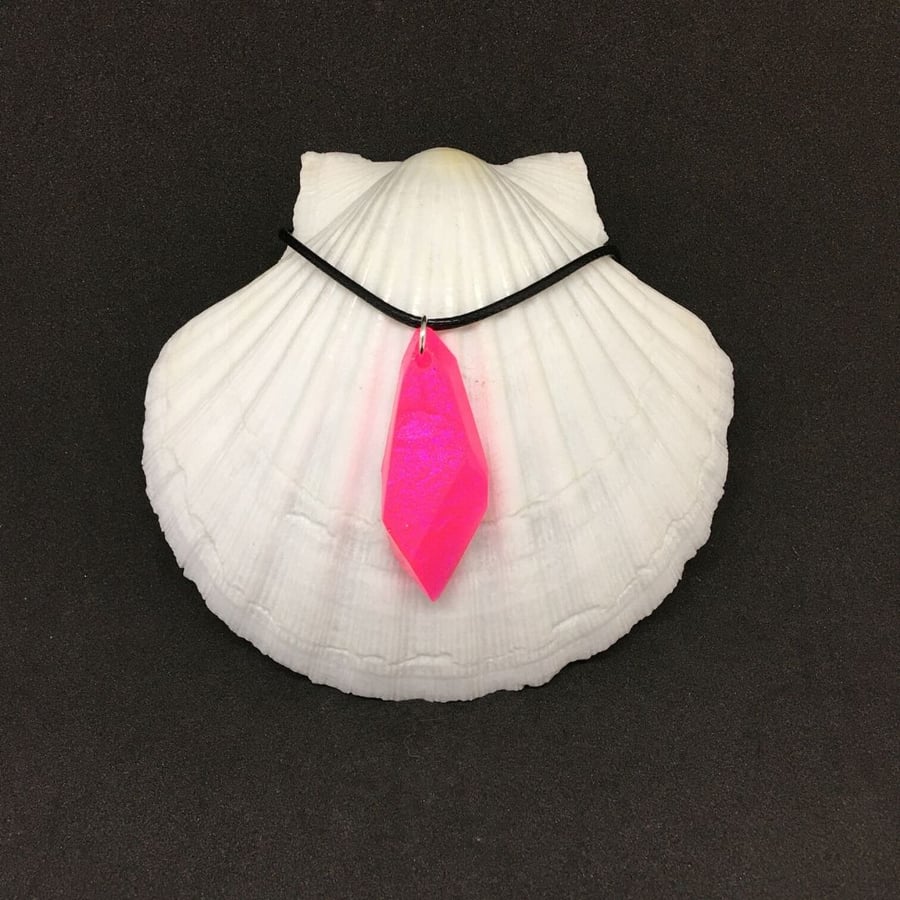 Shocking pink iridescent crystalline shaped necklace.
