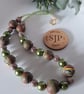 Polymer clay necklace in a brown swirl design with a hint of sparkle - Image 2