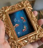Moonlit goldfish painting in gold frame