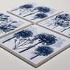 Set of four blue botanical ceramic sandstone coasters