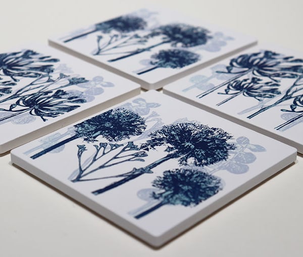 Set of four blue botanical ceramic sandstone coasters