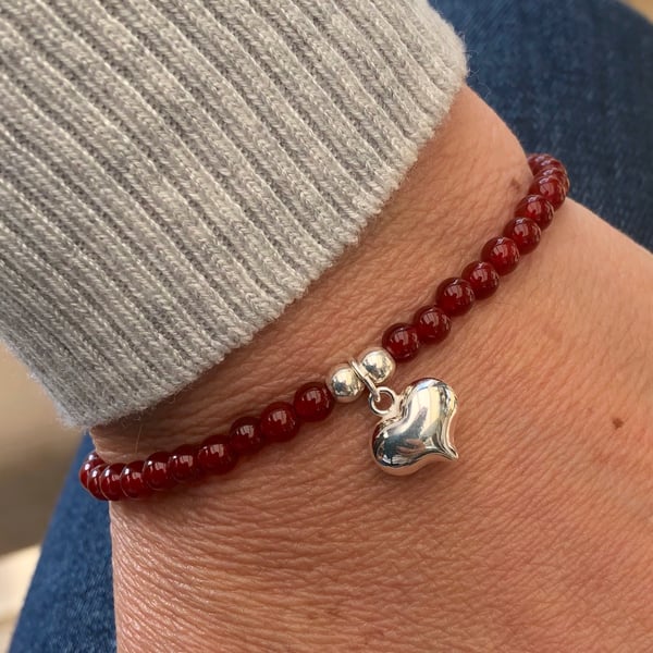 Red carnelian bracelet with puffed heart charm