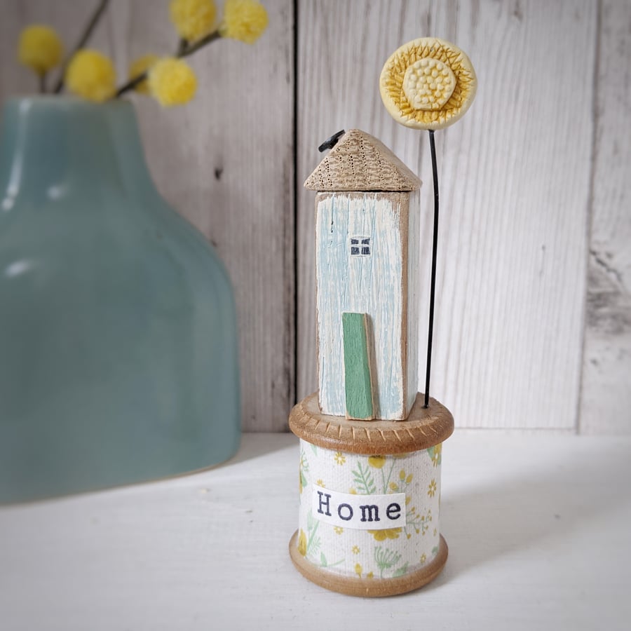Wooden House on a Vintage Floral Bobbin with Clay Sunshine 'Home'