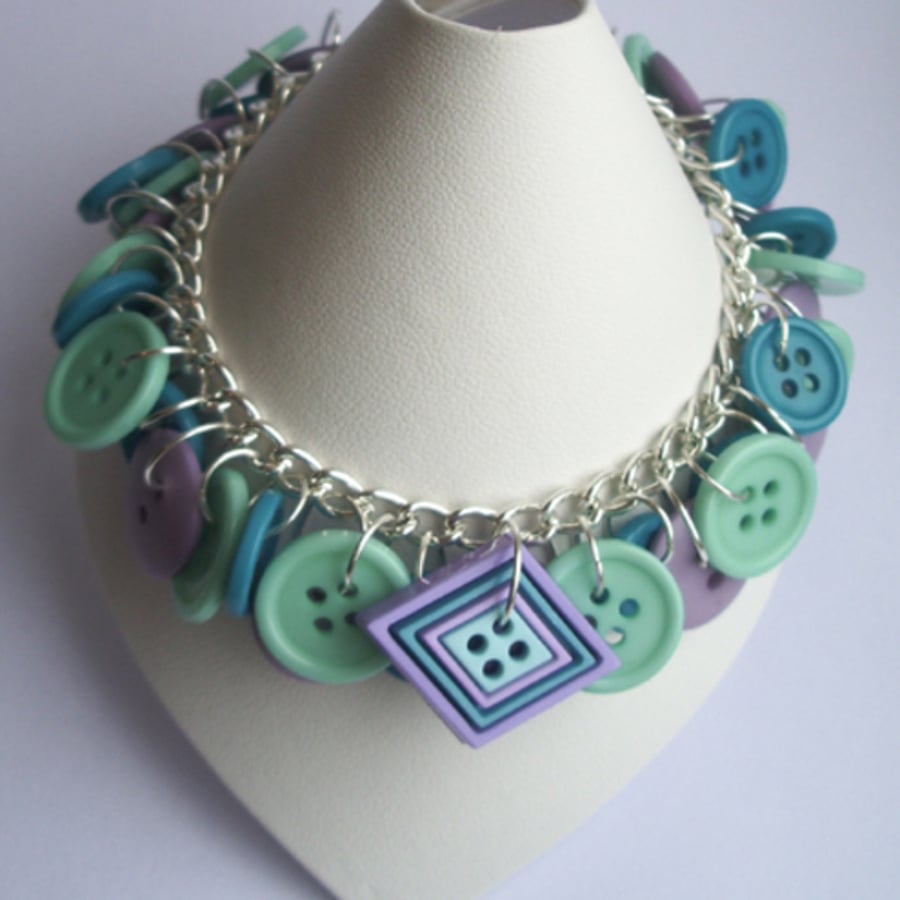 Turquoise, pale green and lilac button bracelet