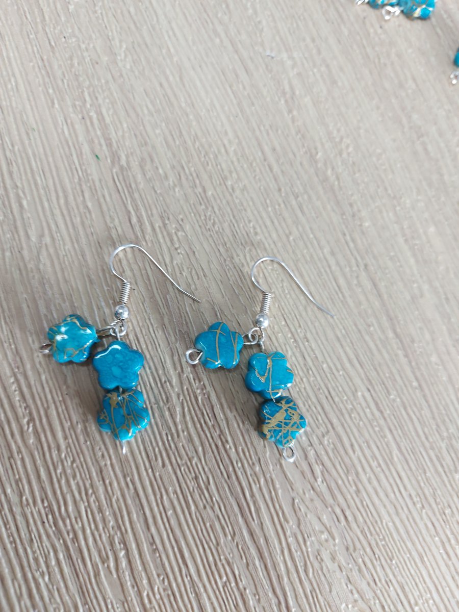 Dangley blue star earrings 