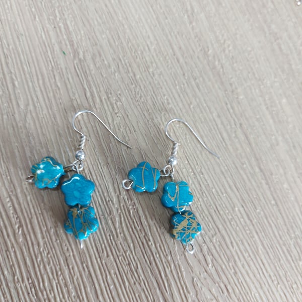 Dangley blue star earrings 