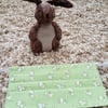 Adult face covering – pale green rabbit print material