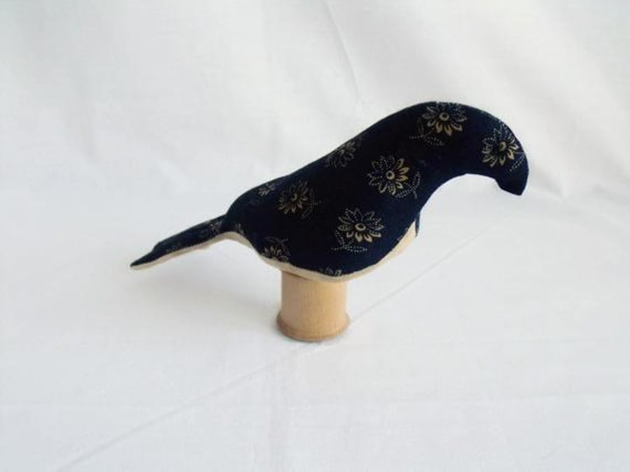 novelty bird ornament or bird pin cushion on a vintage wooden bobbin, navy