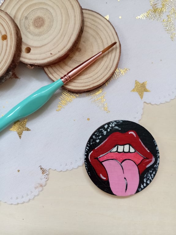 Wooden circular cheeky tongue fridge magnet 