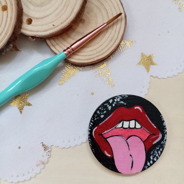 Wooden circular cheeky tongue fridge magnet 