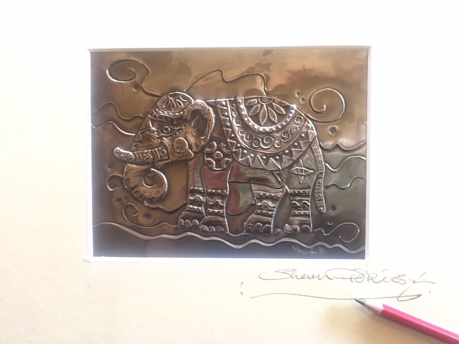 Elephant picture made of pewter