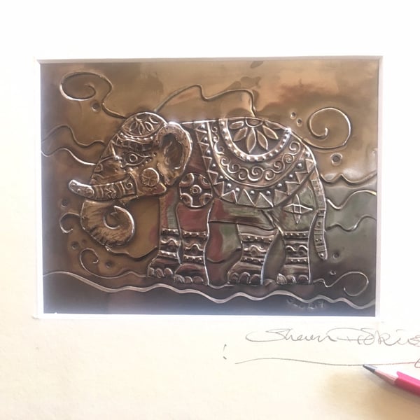 Elephant picture made of pewter