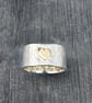 Chunky Hammered Silver Ring with gold heart ring