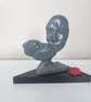 Abstract Male & Female Kissing Couple On Wood Plinth