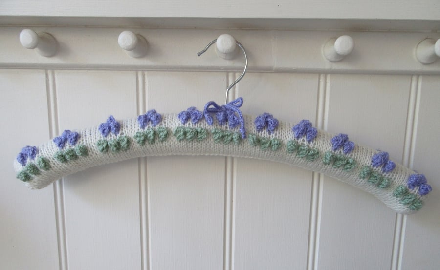 Clothes hanger coat hanger with lavender bobble bud flowers
