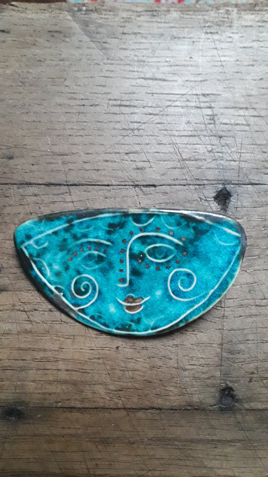 face brooches