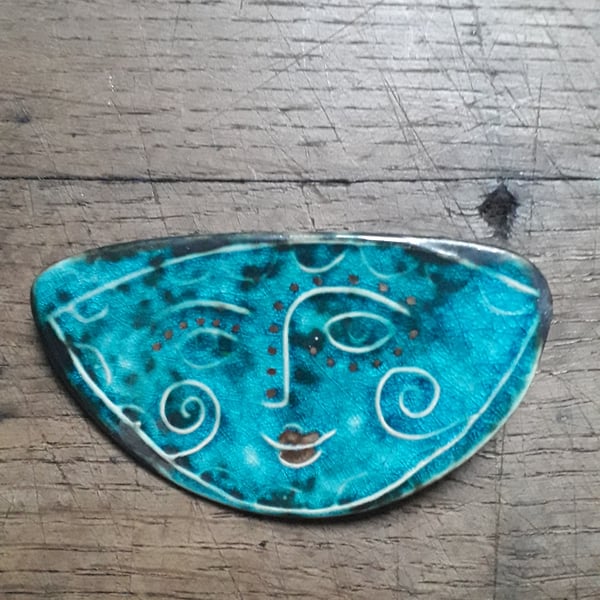 face brooches
