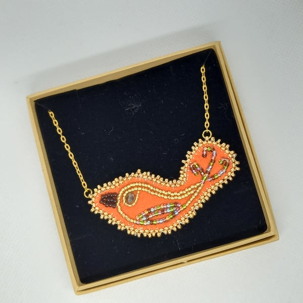 Orange bird pendant
